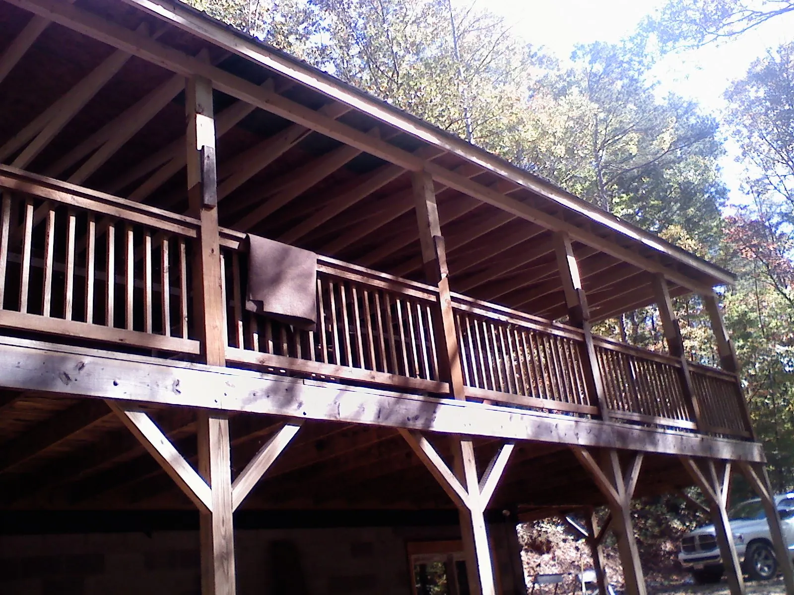 Timber framing under a new elevated porch and deck — Roof Leak Repair in Islandia by Roofing Brothers